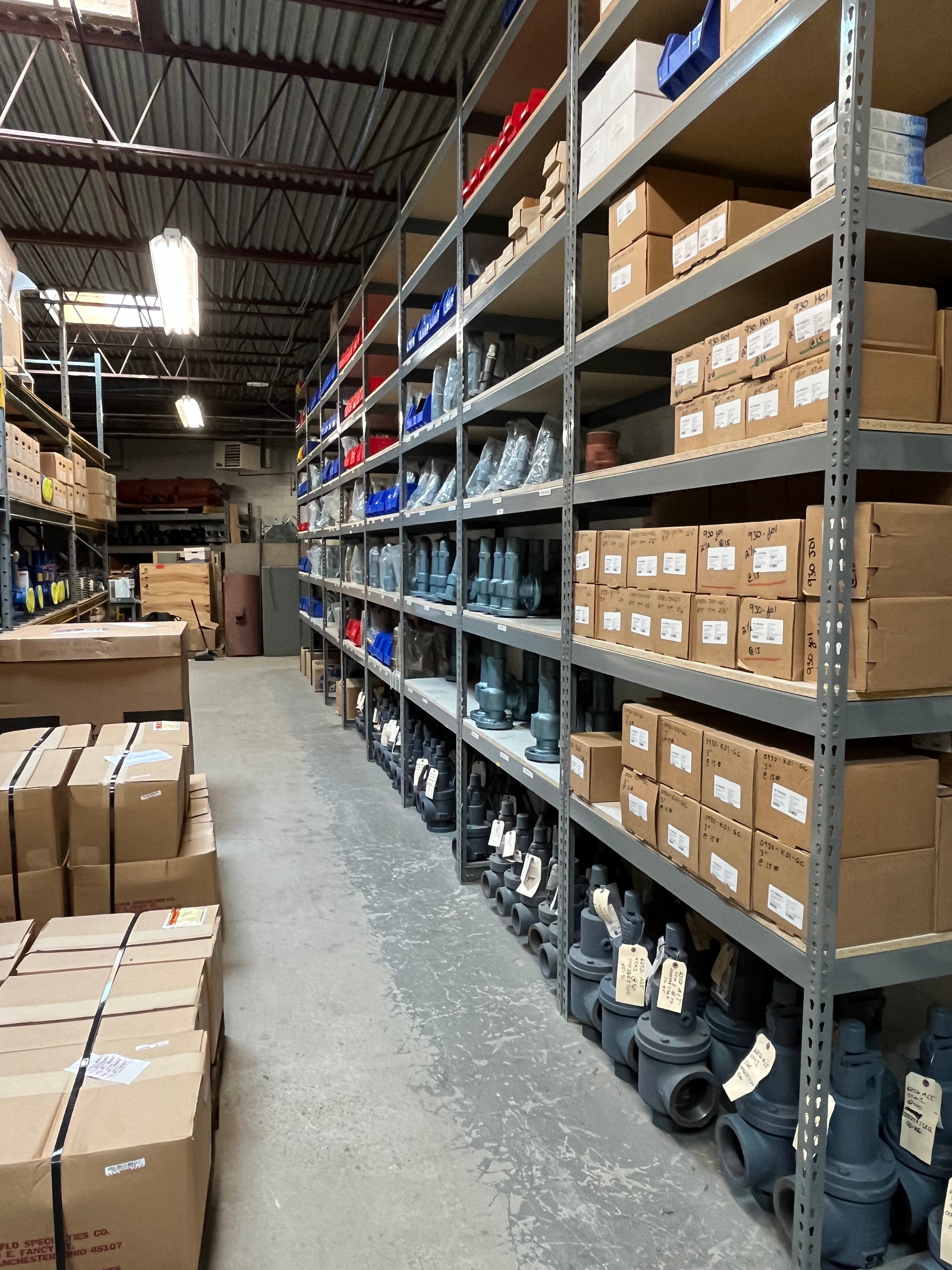 Rivet Shelving in Warehouse with boxes on floor